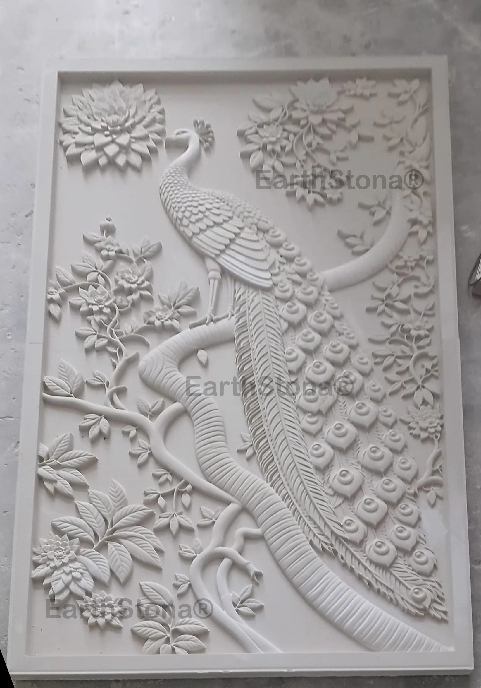 Royal peacock and floral 3D carved stone wall mural by EarthStona for a luxury interior